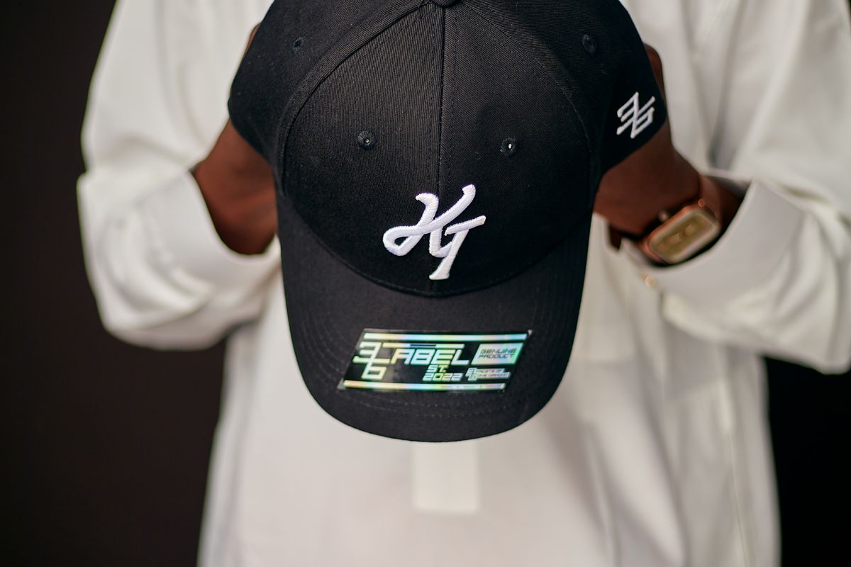 Three baseball caps side by side showing a fitted cap, a snapback closure and a leather strapback buckle